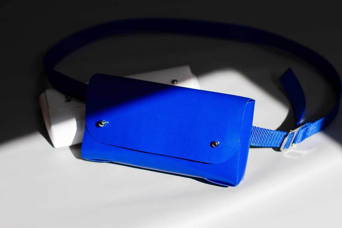 Tasket Fanny Pack in blue, styled shot