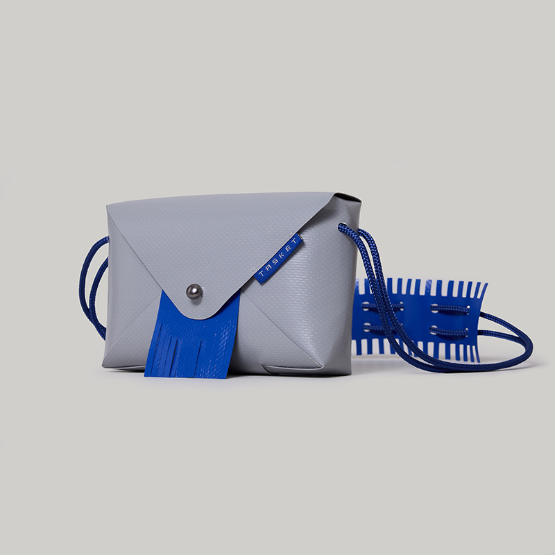 Tasket Mini Bag in grey with fringe stencil design