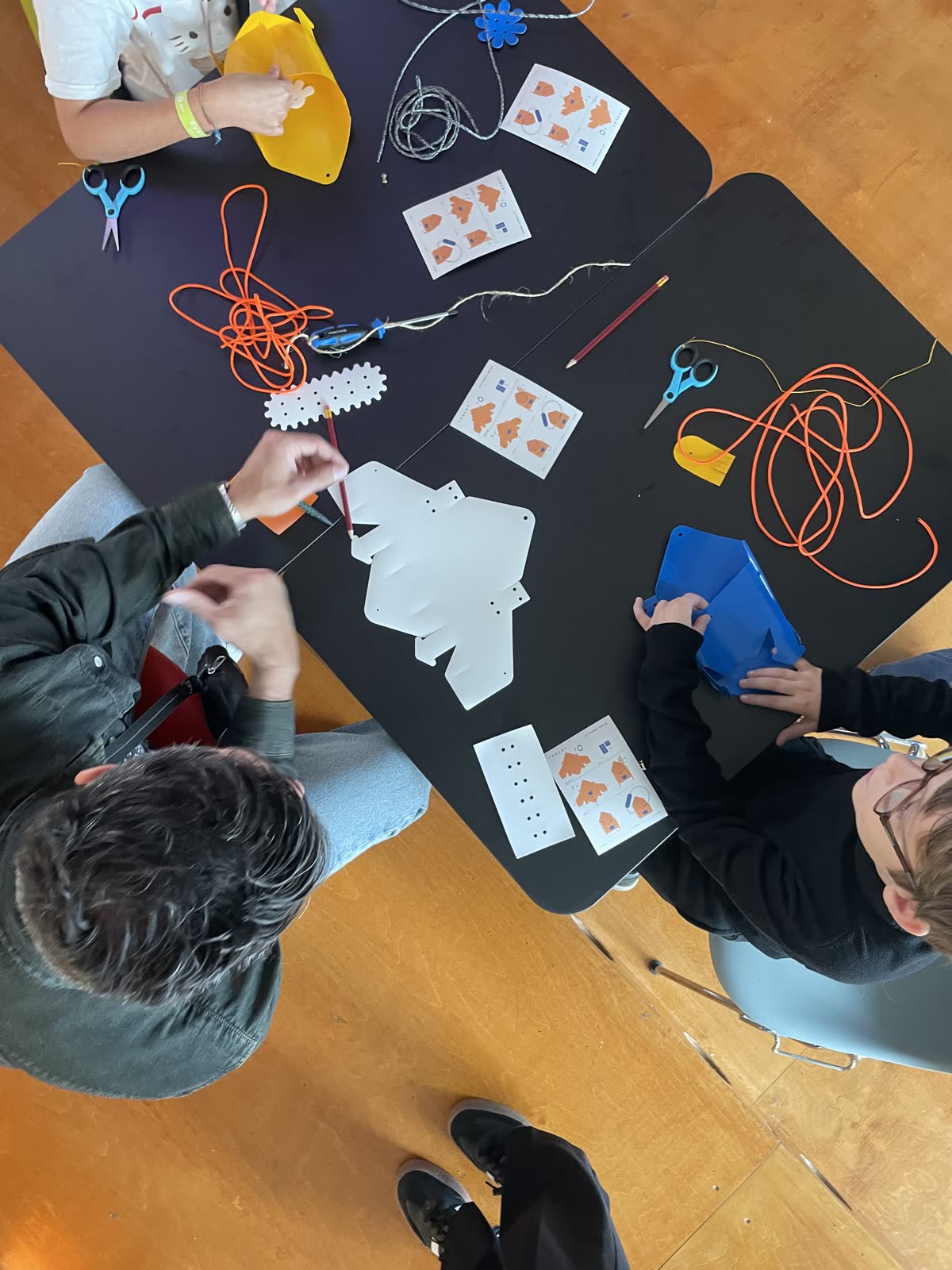 Overhead view of participants building their bags at a workshop